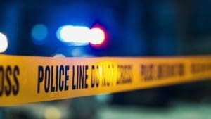 Police tape at night with lights