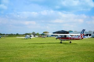 Light aircraft at a small grass airfield in the Kent countryside, similar to Headcorn Aerodrome where a skydiver died on Easter Monday 2026