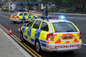 Kent Police cars at an incident scene